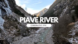 Flying Near the Stunning Frozen Waterfall on the Piave River in Italy