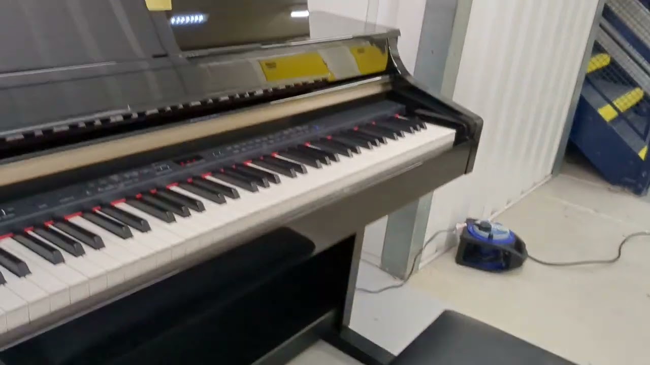 Yamaha Clavinova CLP-340PE digital piano and stool in glossy black
