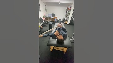 Supine dowel rod assisted flexion