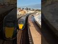 GWR class 800 speeds down the seawall into Kennaway tunnel- Paddington Penzance service 800 303 IET