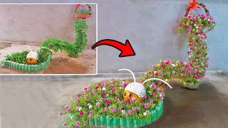 Unique worm-shaped flower garden with moss roses | Best flower pots from plastic bottles