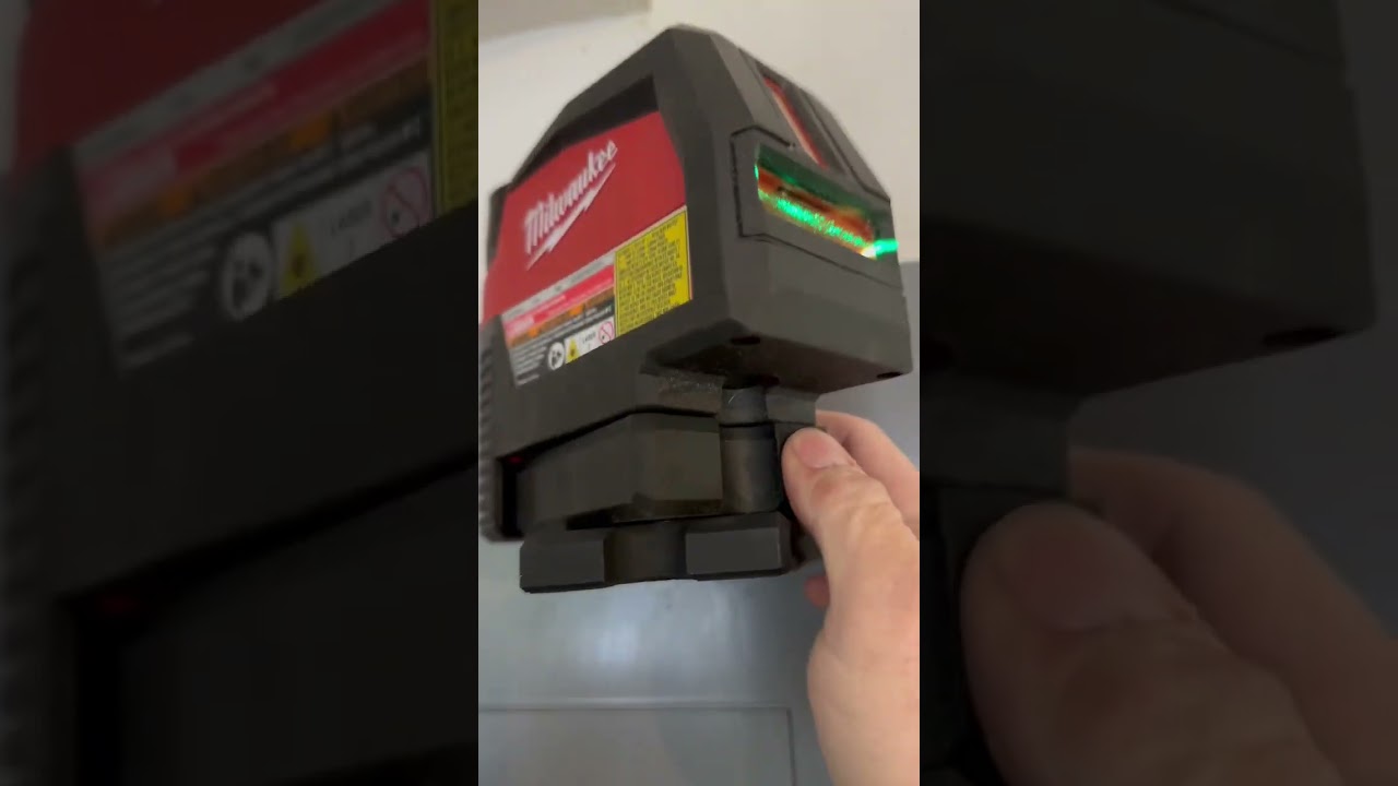 Using the laser level to install some hanging storage. 