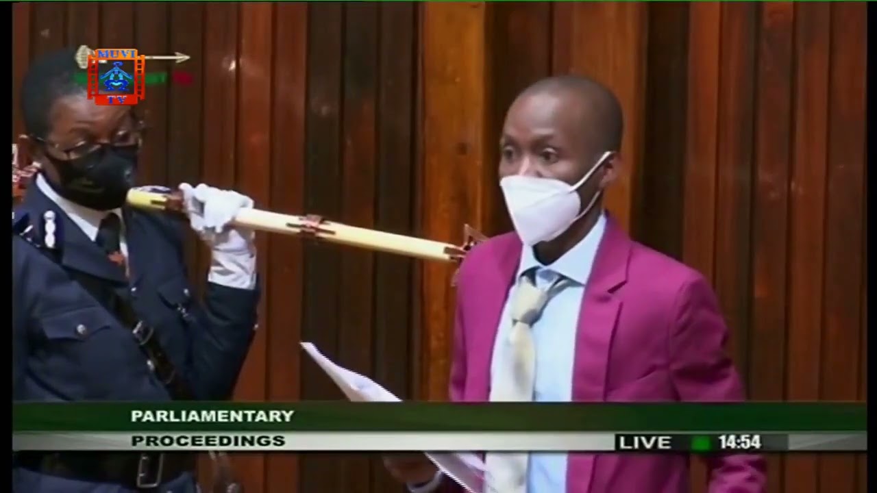 Munir Zulu struggles as he is made to read his apology to Gary Nhkombo in parliament.