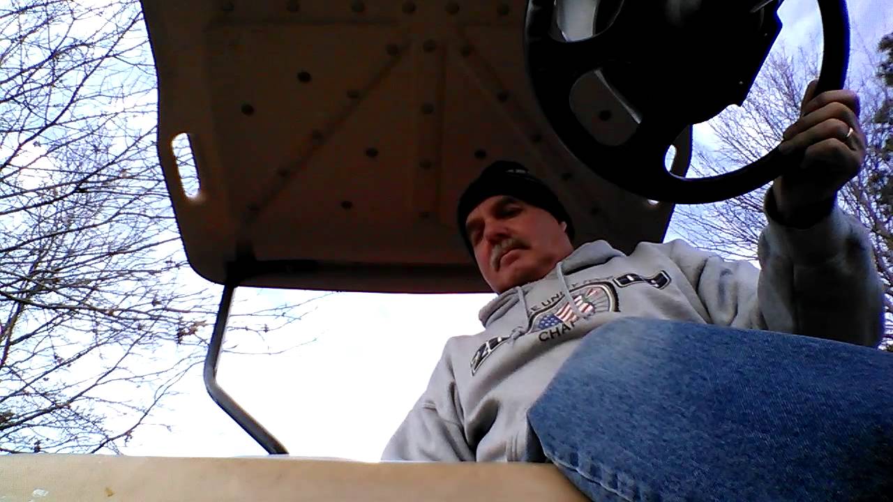 Rudy at work on golf cart. YouTube