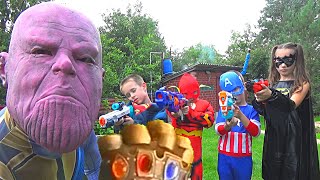 Nerf Battle Superhero kids vs Thanos pretend play for kids