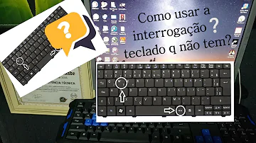 Onde fica o ponto de interrogação no teclado da Dell?
