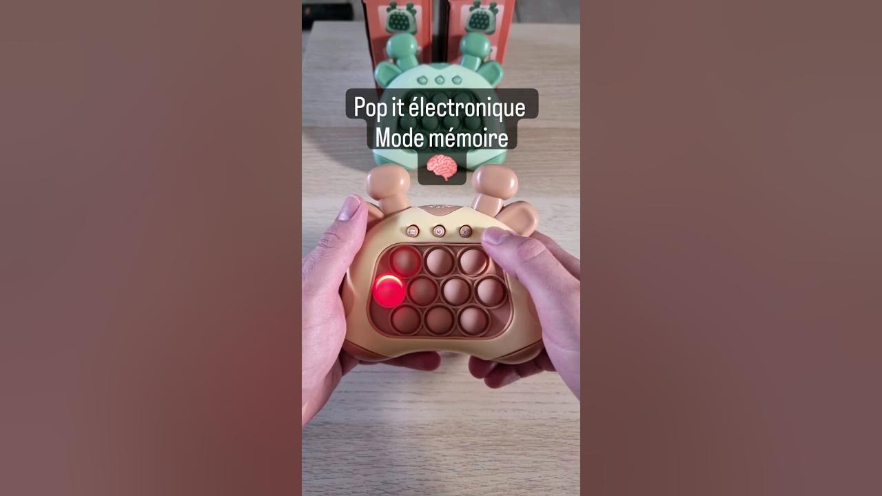 Pop-it Quickpush Rose - Électronique - Jeu Pop-it - Entraîneur de mémoire -  Test des