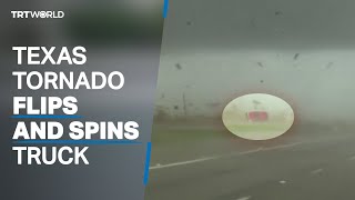 Texas tornado flips truck across highway with driver still inside