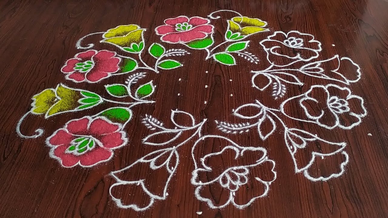 Sankarthi chukkala muggulu (13×7) dot's..beautiful flower design ...