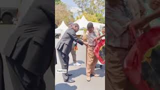 Comic Elder with the President of Zimbabwe, receiving his big Car.