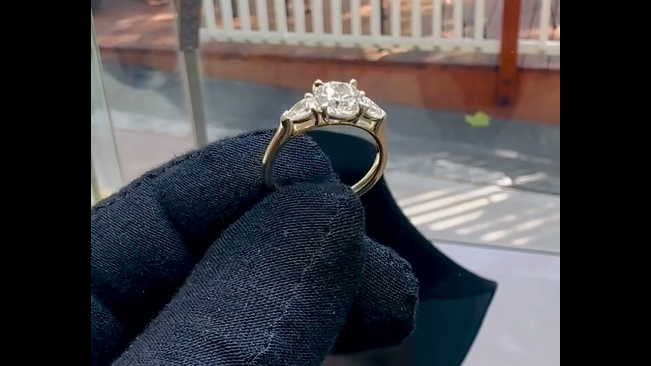 1.5-Carat Diamond Three-Stone Ring with Pear-Shaped Side Stones