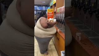 Woman Takes All The Free Coffee At The Gas Station