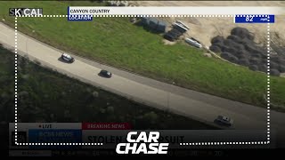 Pursuit suspect tries to hop into another car after crashing into innocent driver