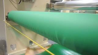 Concave shaped Spreader roller removing film wrinkles