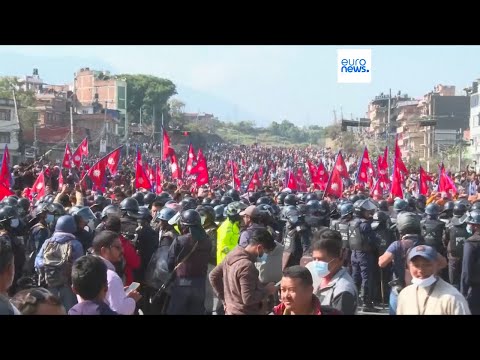 Clashes in Nepal: crowd faces Riot Police in Kathmandu demanding restoration of the monarchy