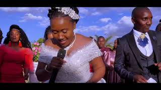 FAITH NZILANI SURPRISES HER HUSBAND WITH A LOVE SONG ON THEIR WEDDING  (KINDU KISEO)Official video.