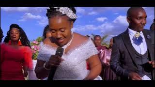 FAITH NZILANI SURPRISES HER HUSBAND WITH A LOVE SONG ON THEIR WEDDING  (KINDU KISEO) video.