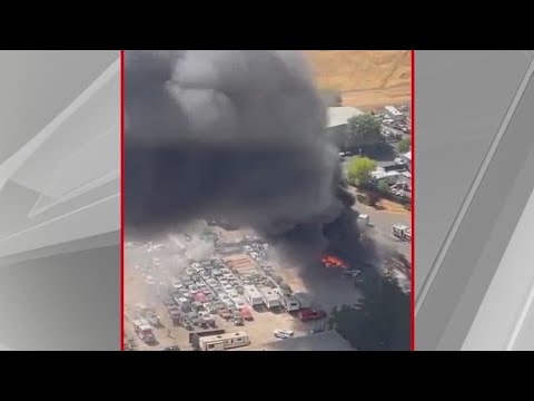 Emergency crews try to put out fire at auto yard in Rancho Cordova ...