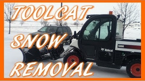 Toolcat 5600 Plowing Snow - Knocking Back Some Hard Drifts
