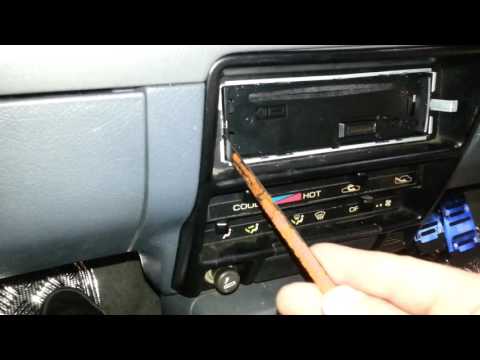 How to remove  a PIONEER radio from it mounting cradle