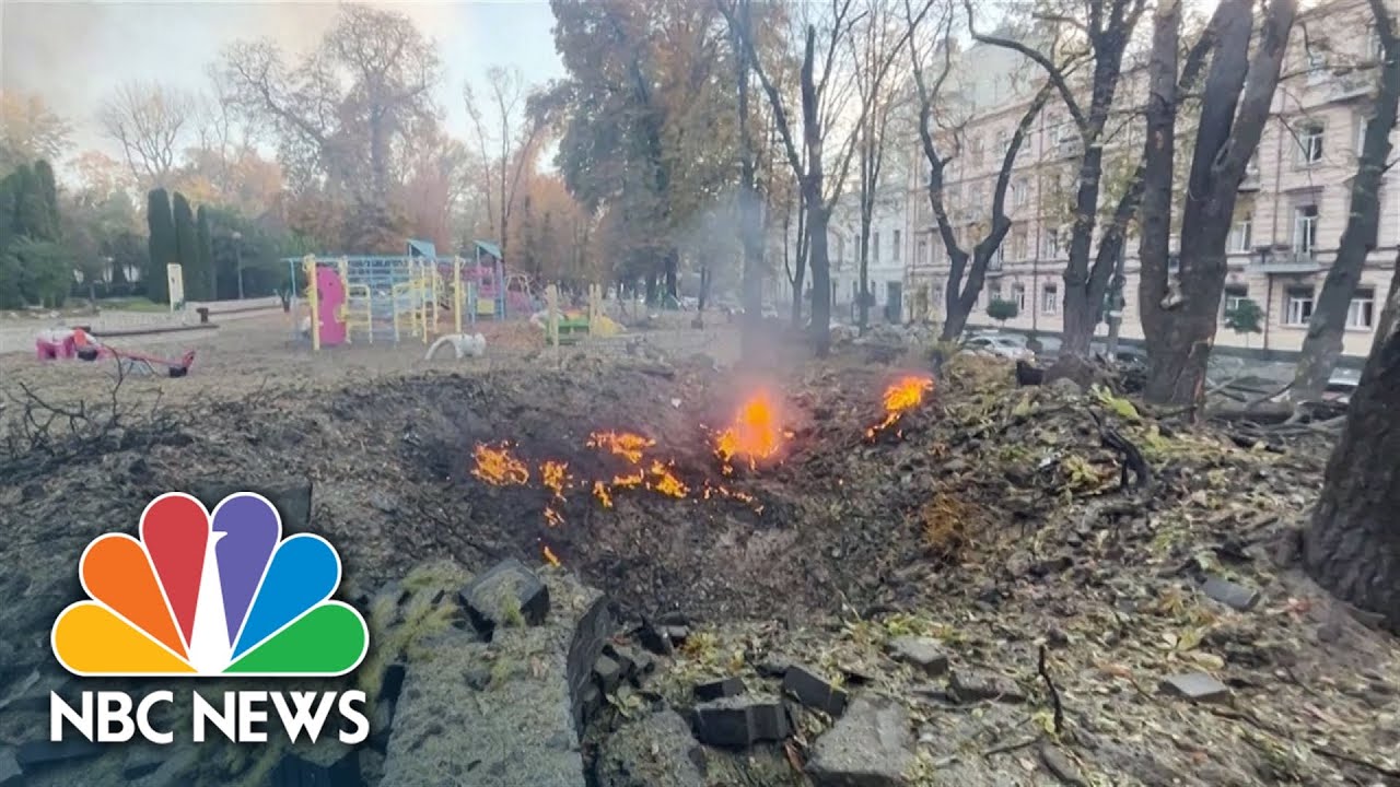 Burning Vehicles, Huge Crater After Explosions Rock Kyiv