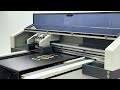 9012 Uv Flatbed Printer Printer prints on coffee table