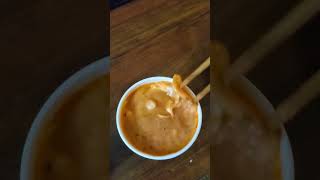 Business Trip Dinner. Pororo Mixing The Chili And Cream Sauce Together.