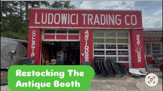 Restocking the Antique Booth with Antique Treasures and Vintage Collectibles in Ludowici Georgia