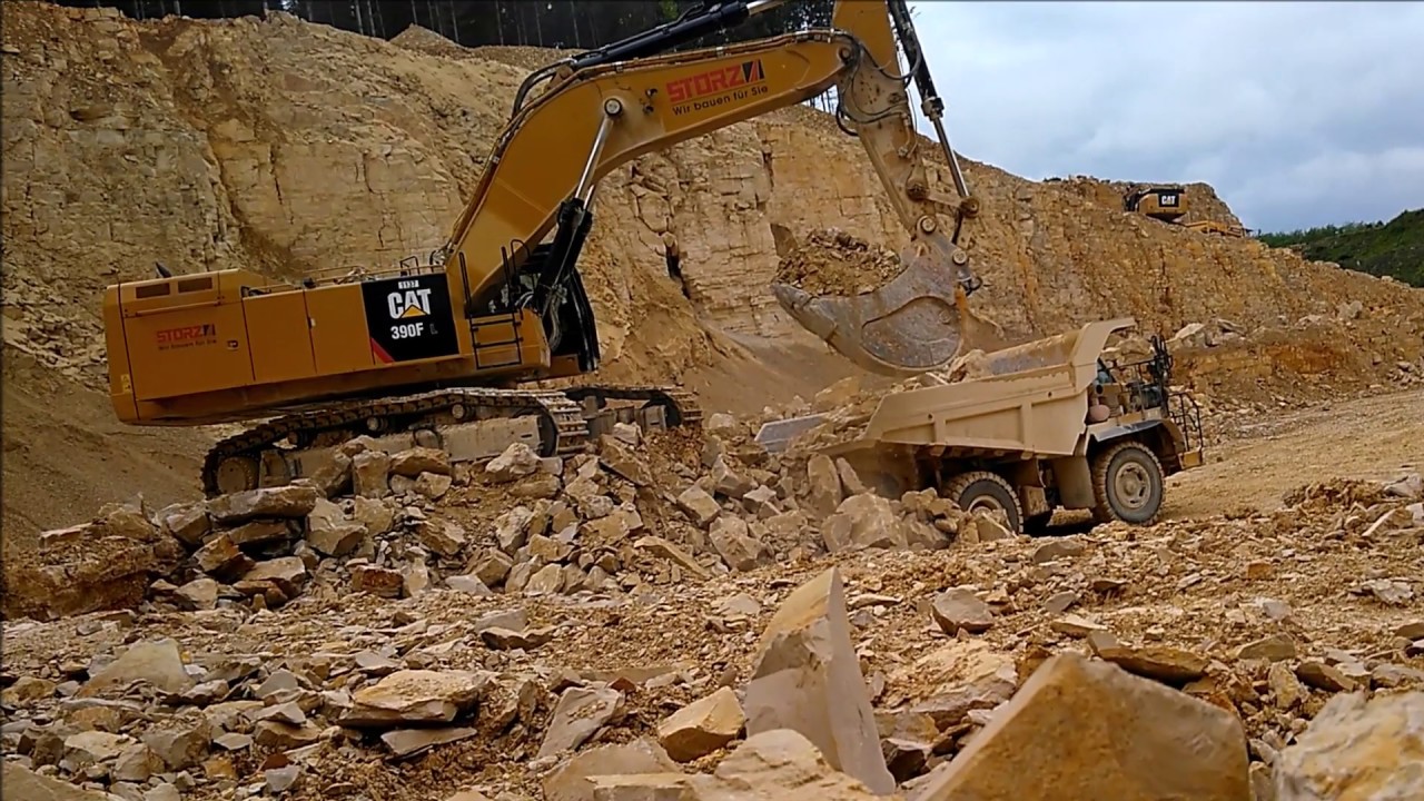 CAT 390F L loading&ripping+timelapse - YouTube