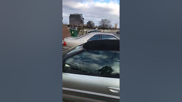 Spark plug breaks car window
