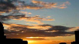 Clouds move out at sunset - Time-lapse