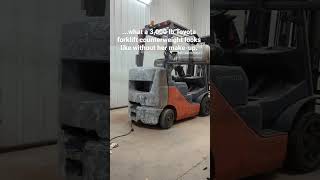 Stripping a forklift counterweight down to the metal...