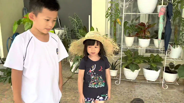 Aldrich & Claire playing with their turtles