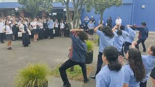 The kapa haka group performing a haka tautoko to the Year 13s