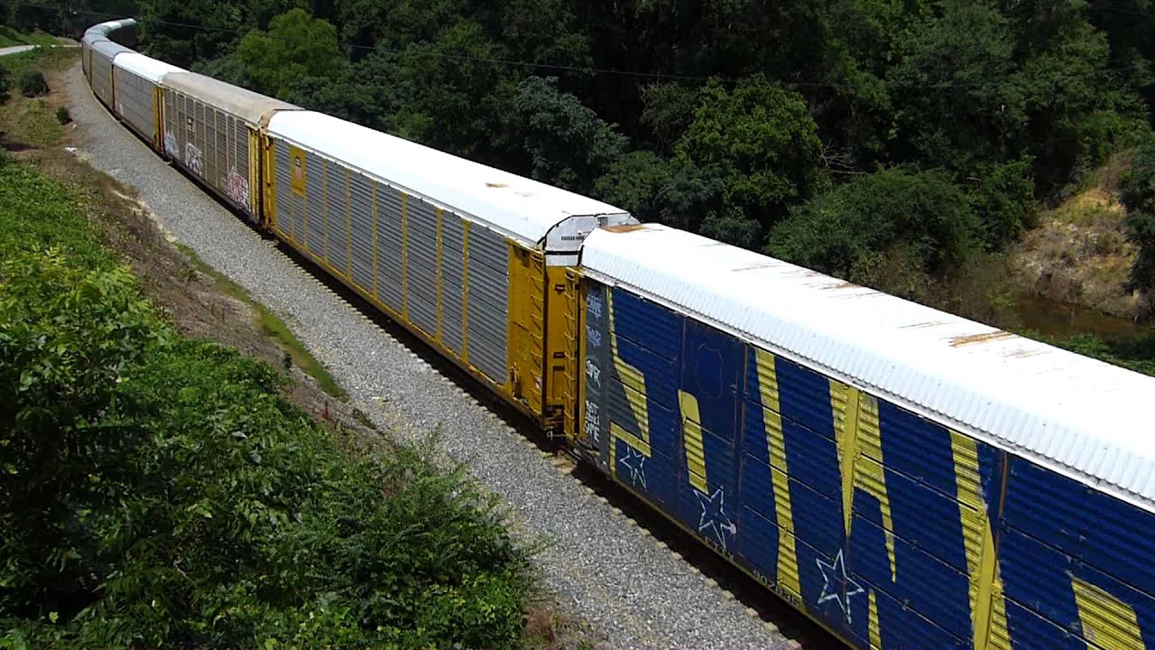 bnsf 5729 CSX Q235 with a trio of EMDs