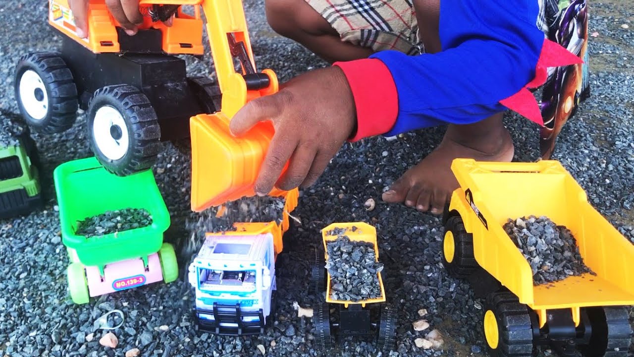 Construction Toy Vehicles Videos Toys Dump Truck With rock and stone