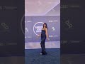 Nina Drama walks the red carpet at the American Music Awards