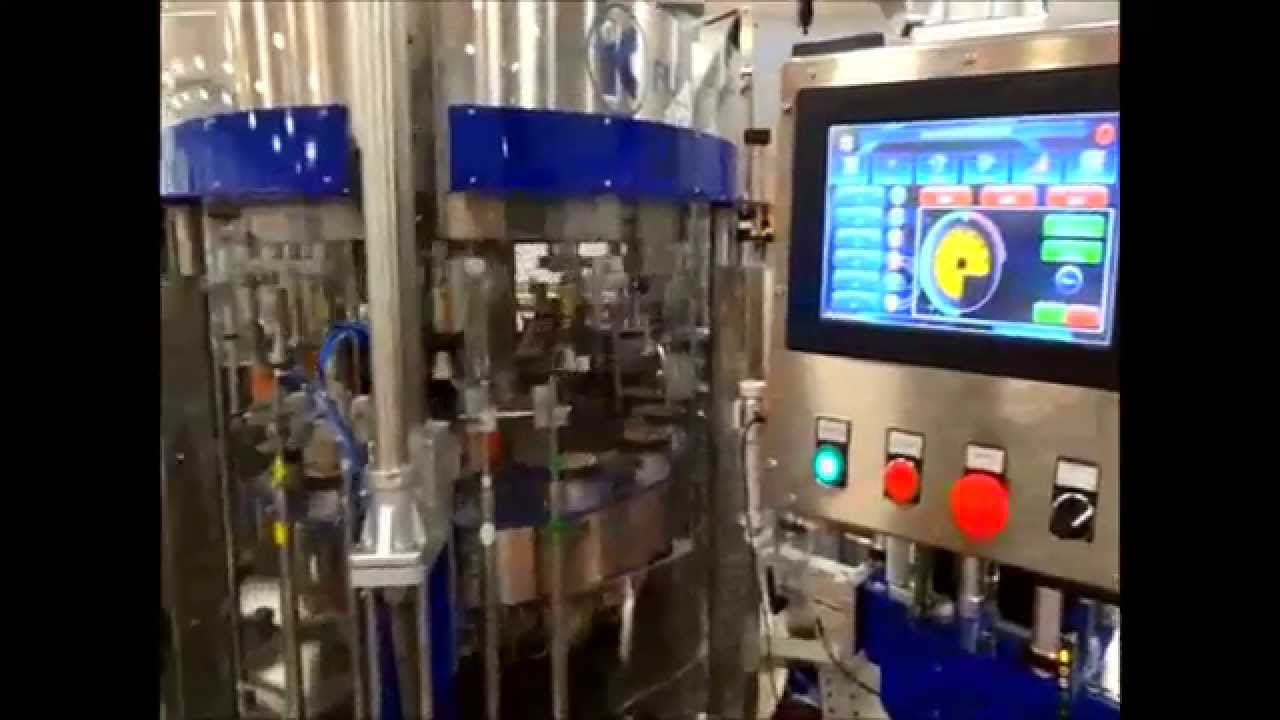 IC Filling Systems- Automatic Rotary Labelling System for Glass Jars