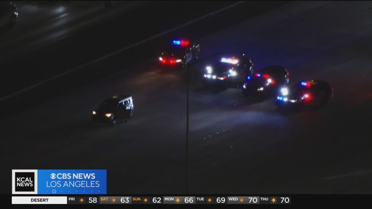 Pursuit suspect surrenders to police in the middle of freeway - YouTube