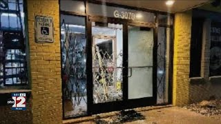 Four people accused of stealing guns from Flint-area pawn shops
