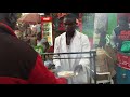 Kenyan street meat eating mutura blood sausage