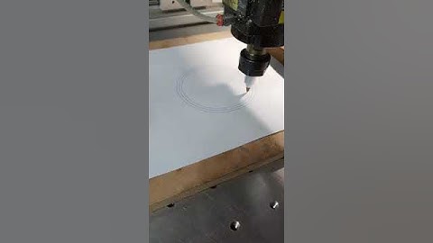 My brothers home-built CNC machine using a just-made plotter pen testing new G-code/PC.