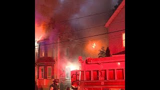 Firefighters rescue 2 people from roof overhang