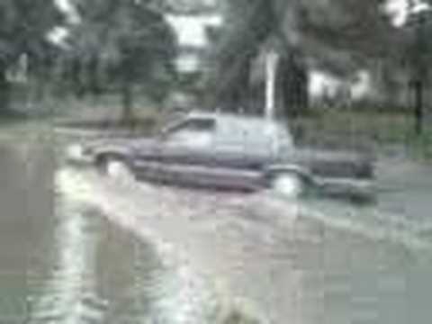 Recently the city of Brandon, Manitoba in Canada experienced an extreme thunderstorm which brought hail, funnel clouds, and massive amounts of rain to the region in a short period of time. This video was taken by mobile phone near the intersection of Richmond and First Street late in the afternoon on June 30th, 2006.