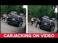 Woman pulled from vehicle in violent carjacking caught on video