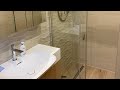 Porcelanosa Wet room install time lapse