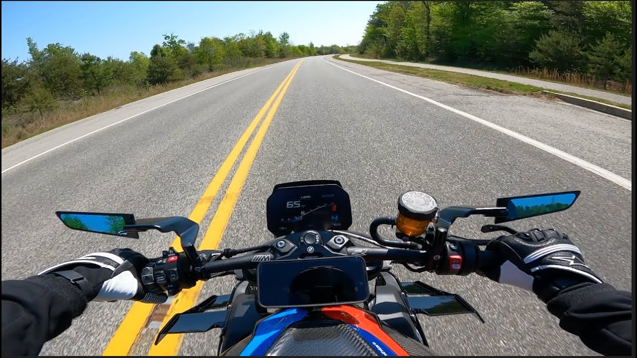 I installed Evotech bar end weights and stealth mirrors on my BMW M1000R Competition!!!