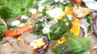 Amazing Thai food cooking. The best Thai cuisine. Harmony of Chinese noodles and fresh seafood.
