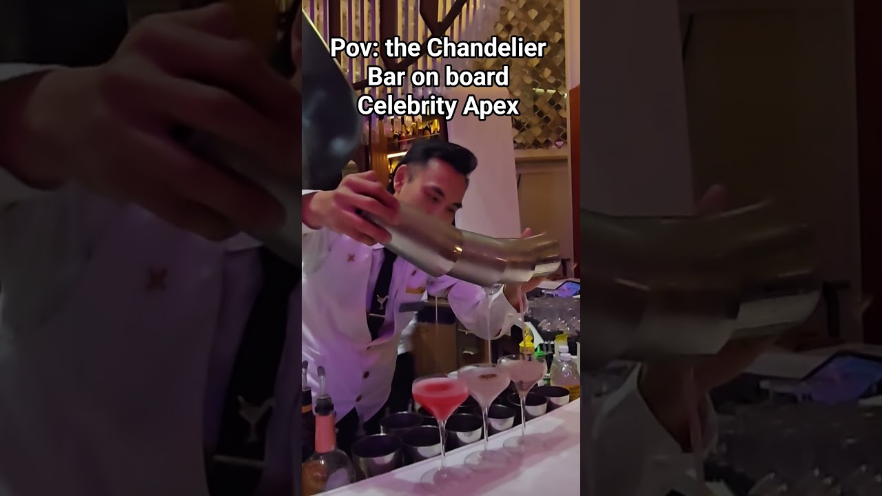 Chandelier Bar on Celebrity Apex! These bartenders are amazing and so talented! #cruise #travel