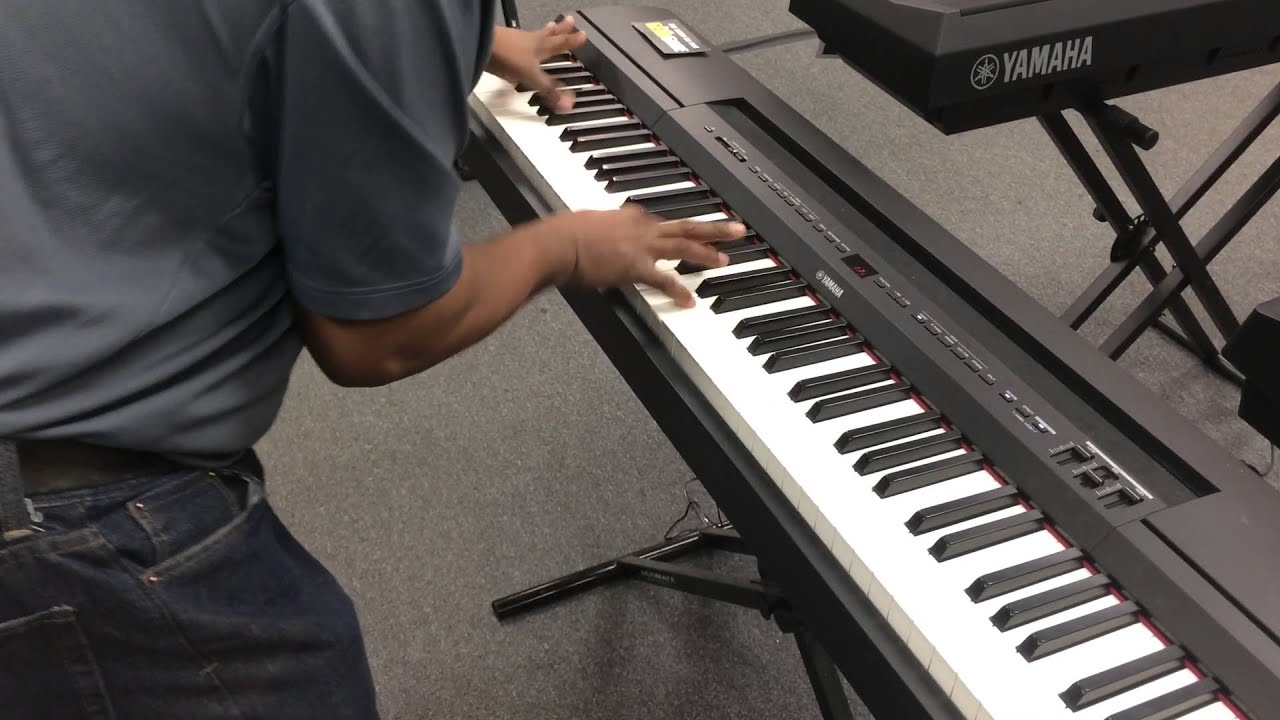 Kris Nicholson Kris Nicholson Test Driving a Yamaha P-255 Digital Piano  at Sam Ash